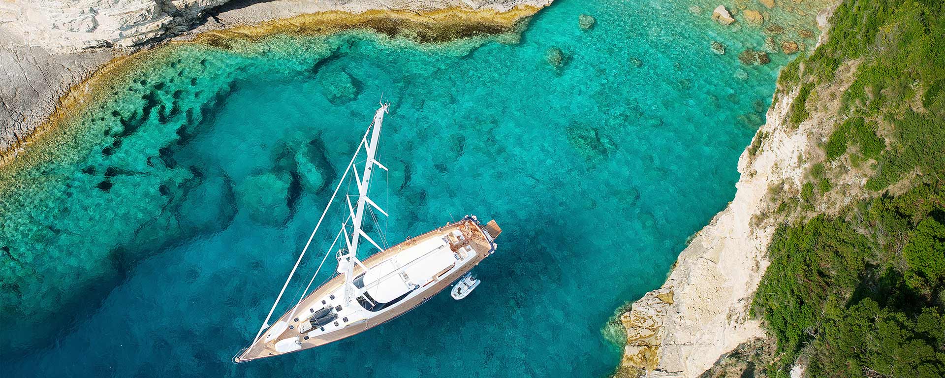 Sail boat on turquoise water